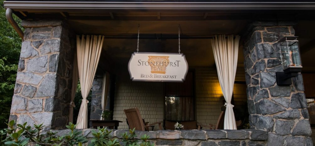 The sign and outdoor porch by the entrance to Stonehurst Place