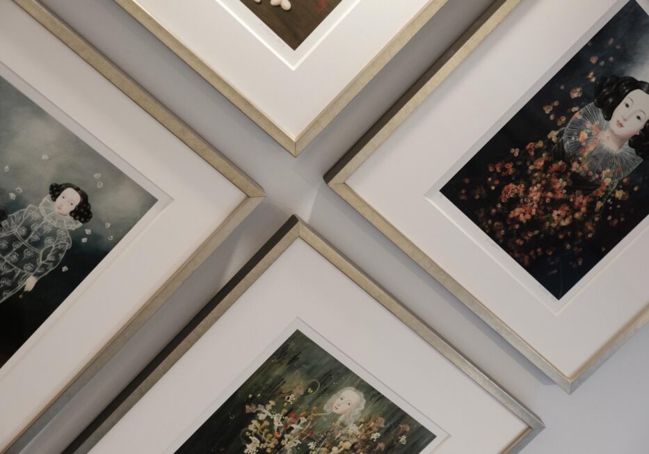 Framed colored portraits in Stonehurst Place