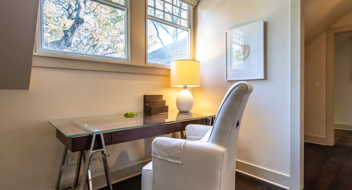 Master Suite white arm char with wood and glass desk