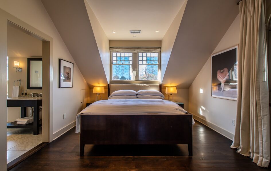 The Master -Stonehurst Pl-94 Master Suite bed with windows overlooking Atlanta