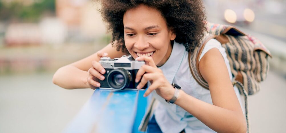 A woman taking a picture at one of the best places to photograph in Atlanta