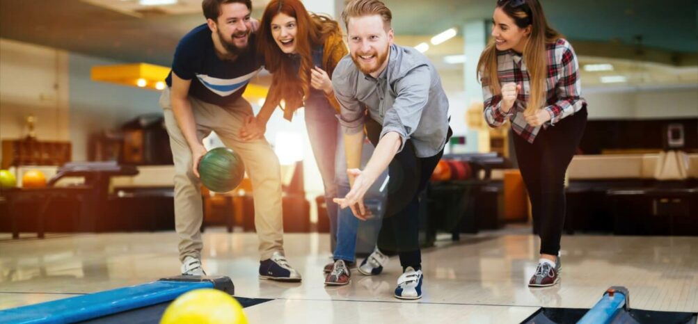 Group of friends enjoying Midtown Atlanta bowling