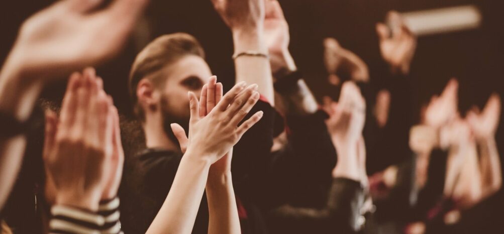Audience clapping at a Midtown Atlanta Theater