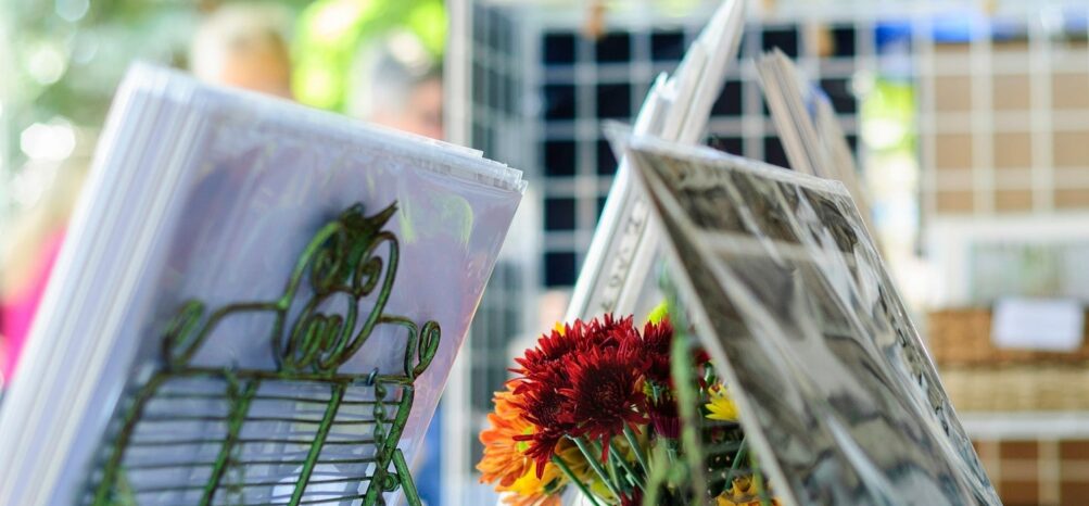 Flowers and paintings at the Piedmont Park Arts Festival