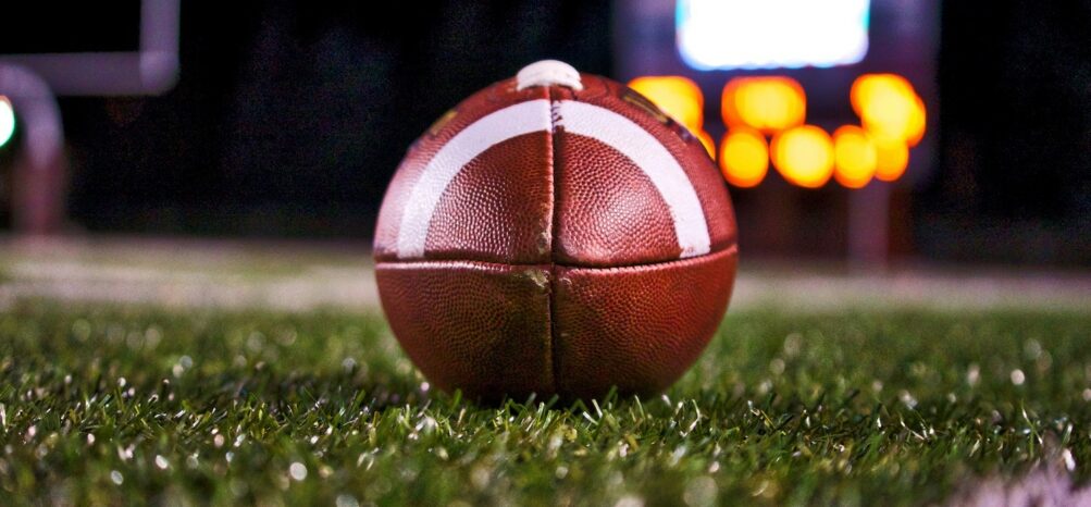 Football on a field for the SEC championship game in Atlanta
