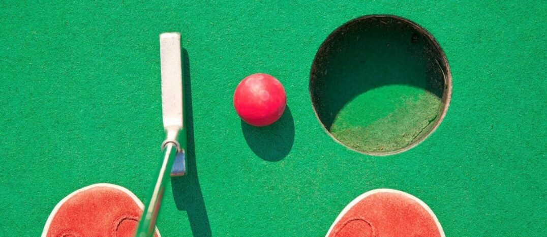 skyline-park-atlanta-1500x609 Person playing mini golf