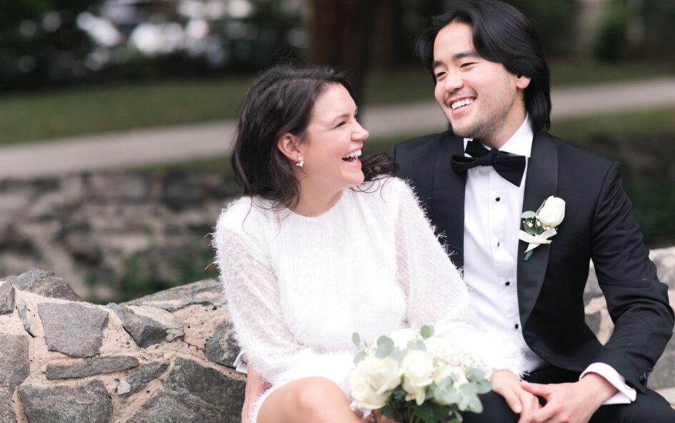 Bride and groom laughing
